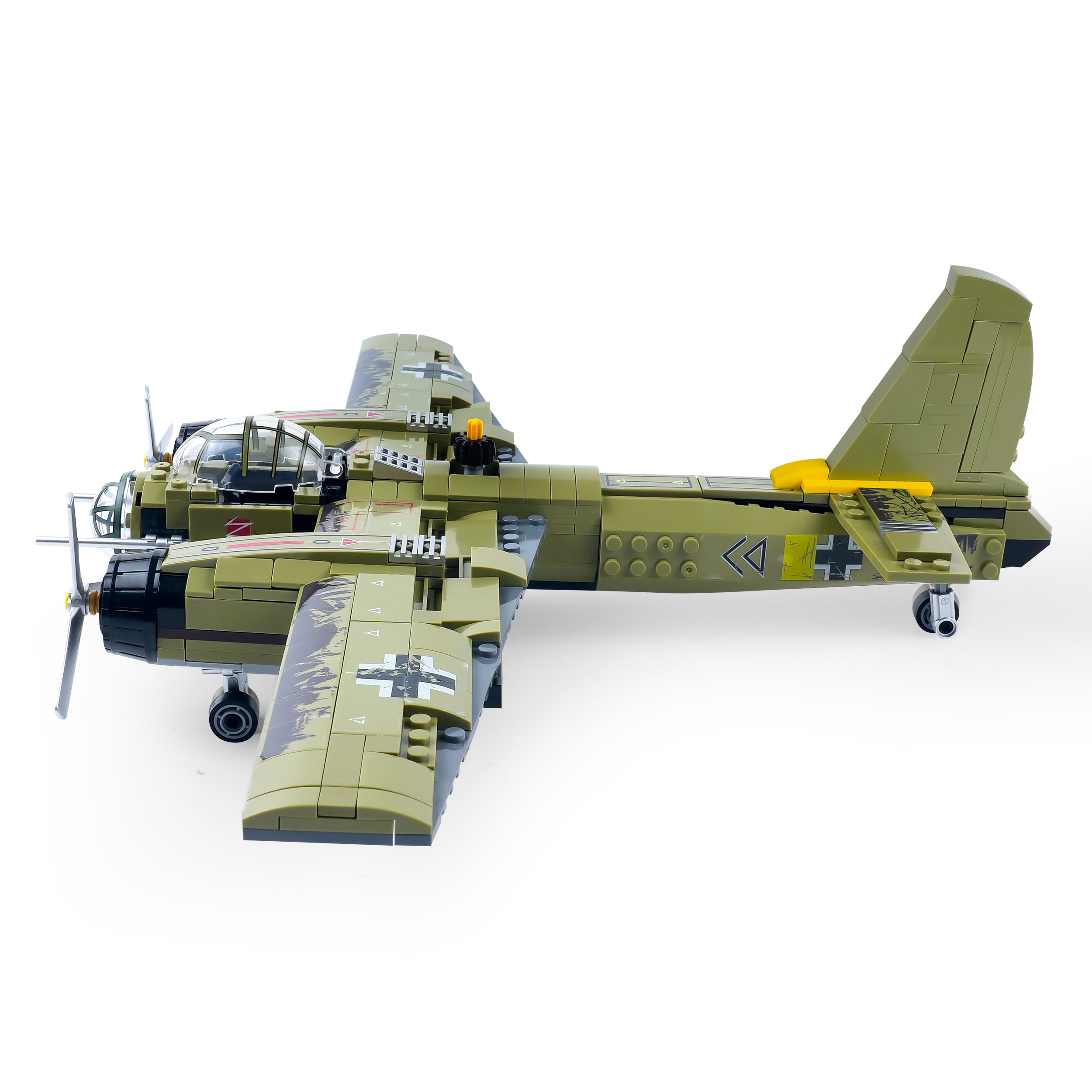 Left side view of the General Jim’s JU-88 Bomber WWII model airplane showing realistic fuselage markings, landing gear, and twin engine brick construction.