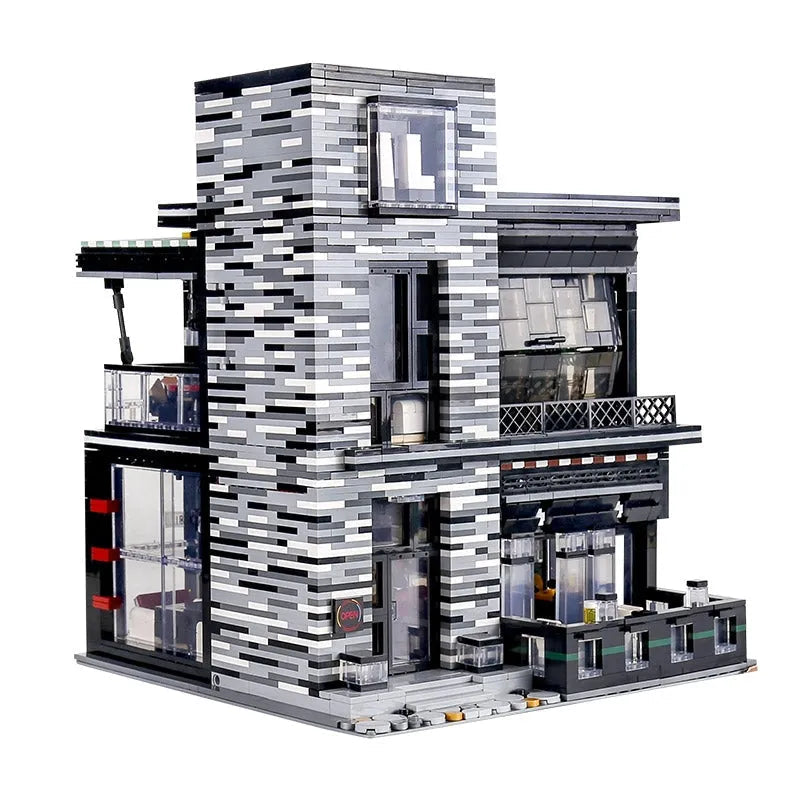 Daytime view of the modular city pub and restaurant model, featuring a modern gray brick façade with black trim and glass windows.