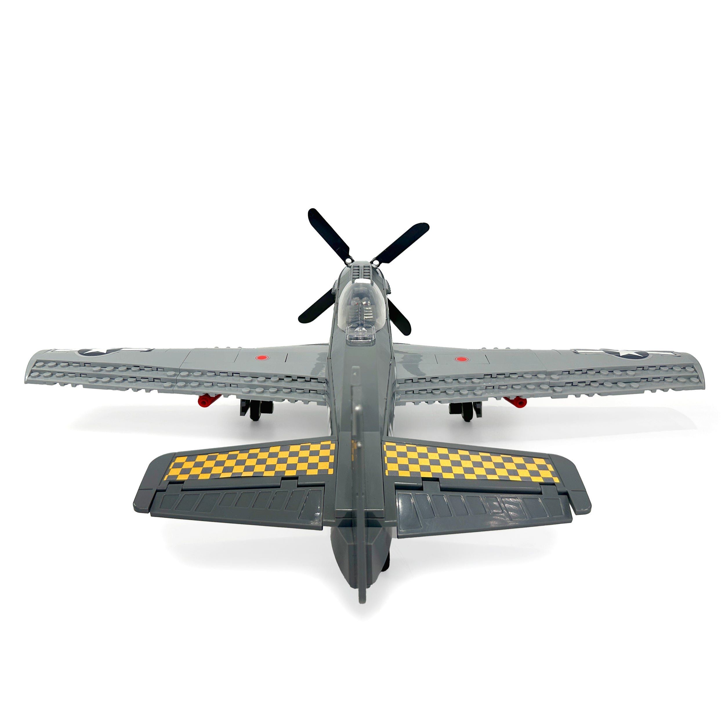 Rear view of P-51 Mustang propeller fighter showing tail and exhaust details