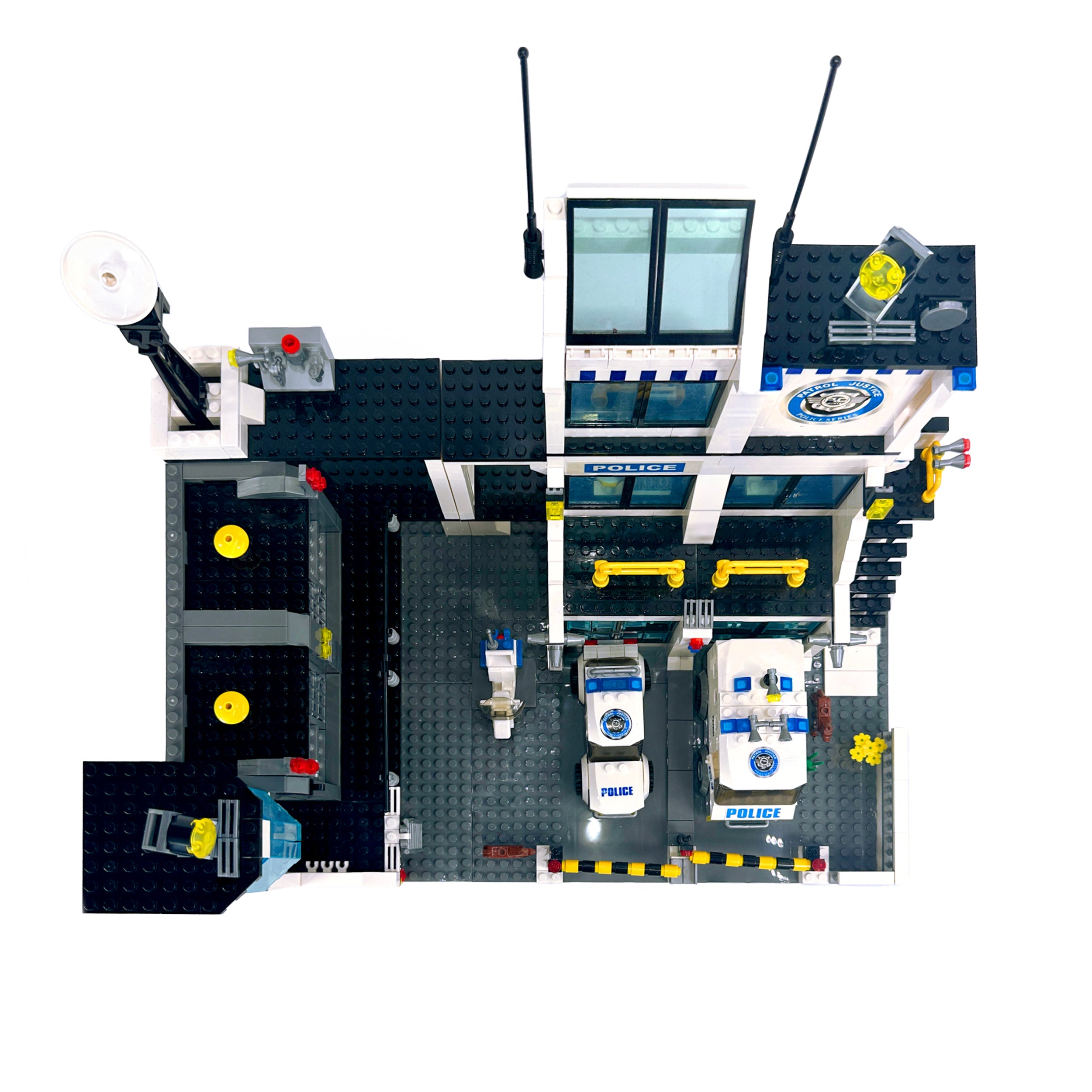 Top-down view of police station and jail modular building set with vehicles