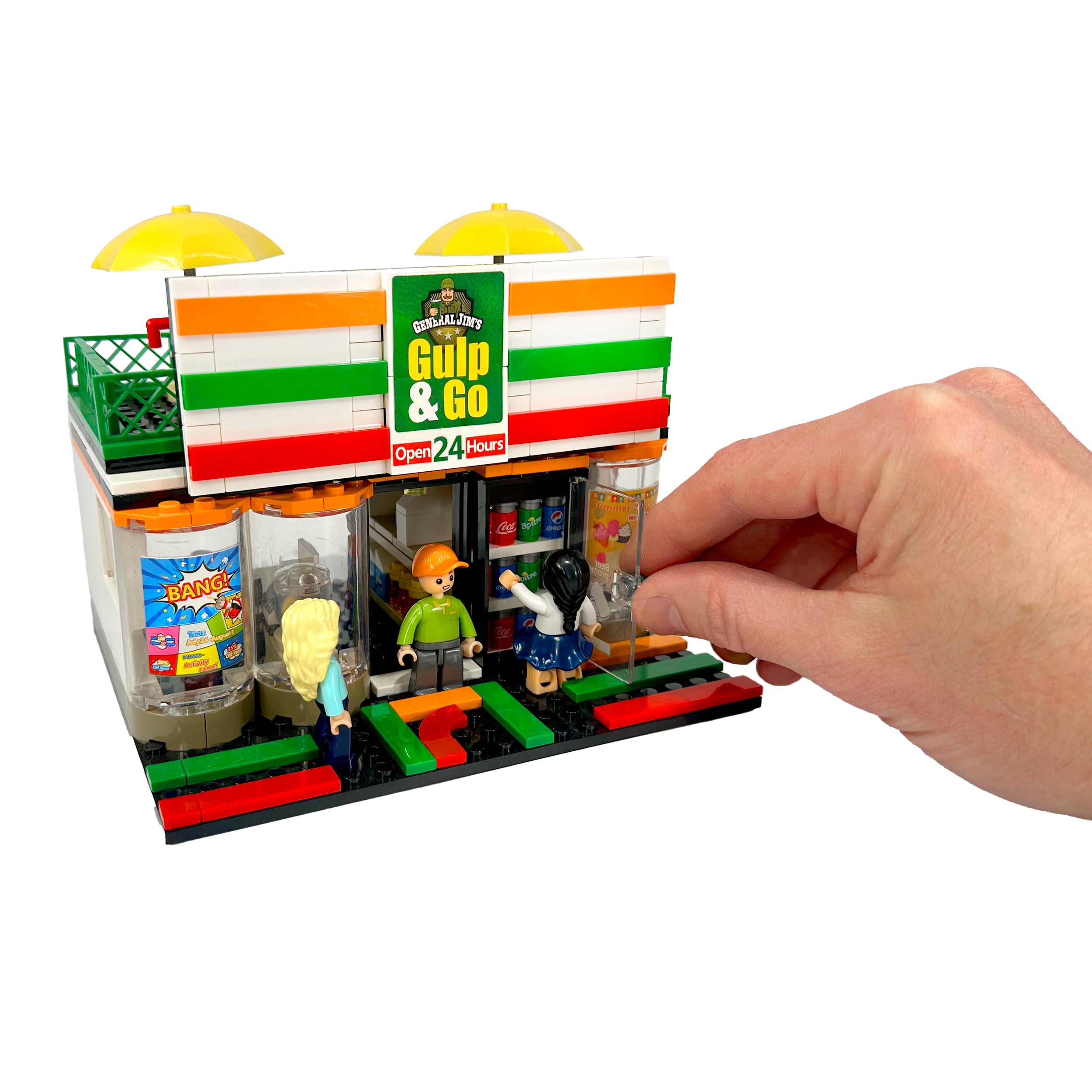 Front angled view with figures and girl reaching for soda bottle, hand for city street scale