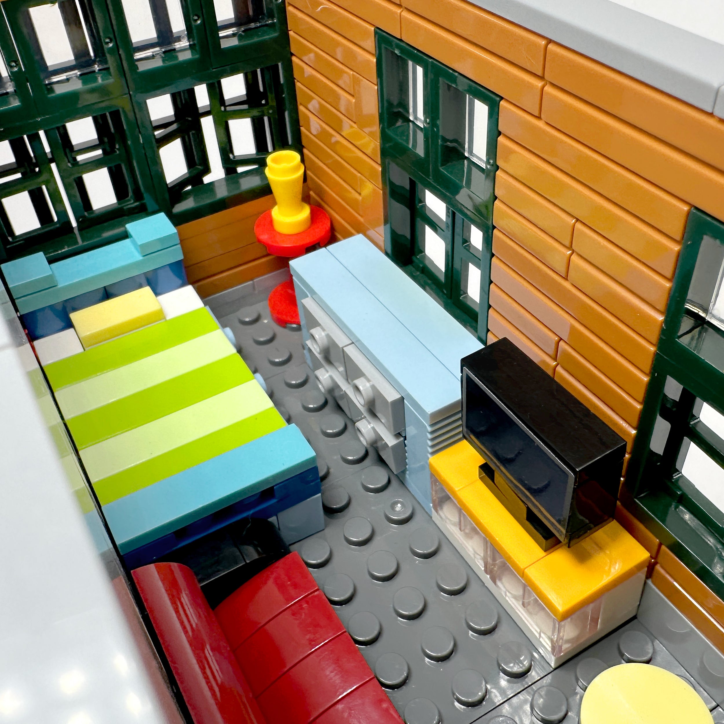 Interior view of second-floor bedroom showing decorative rug and furniture