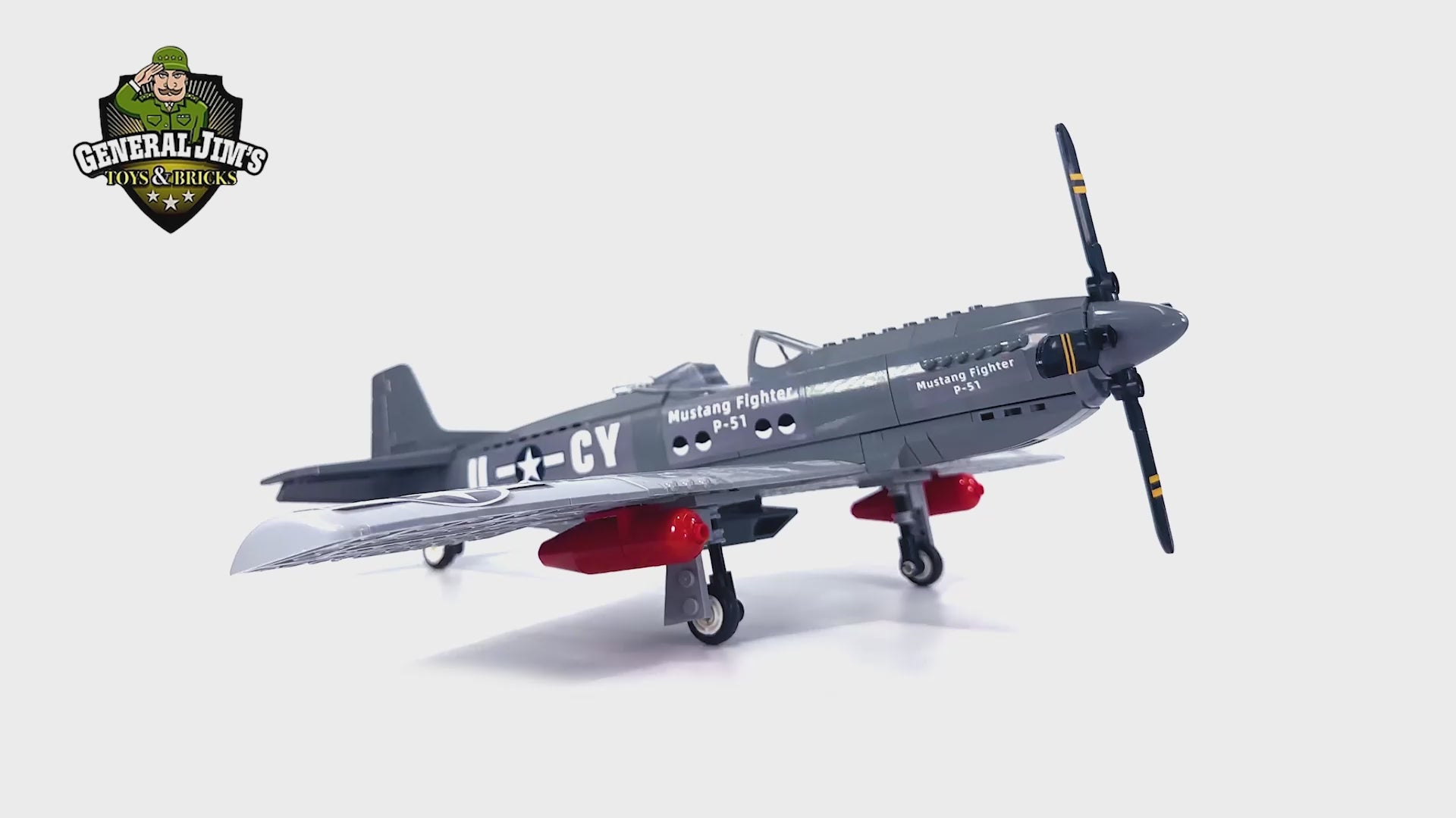 360 degree rotation view of P-51 Mustang WWII fighter plane building block set showing detailed cockpit, wings, and propeller