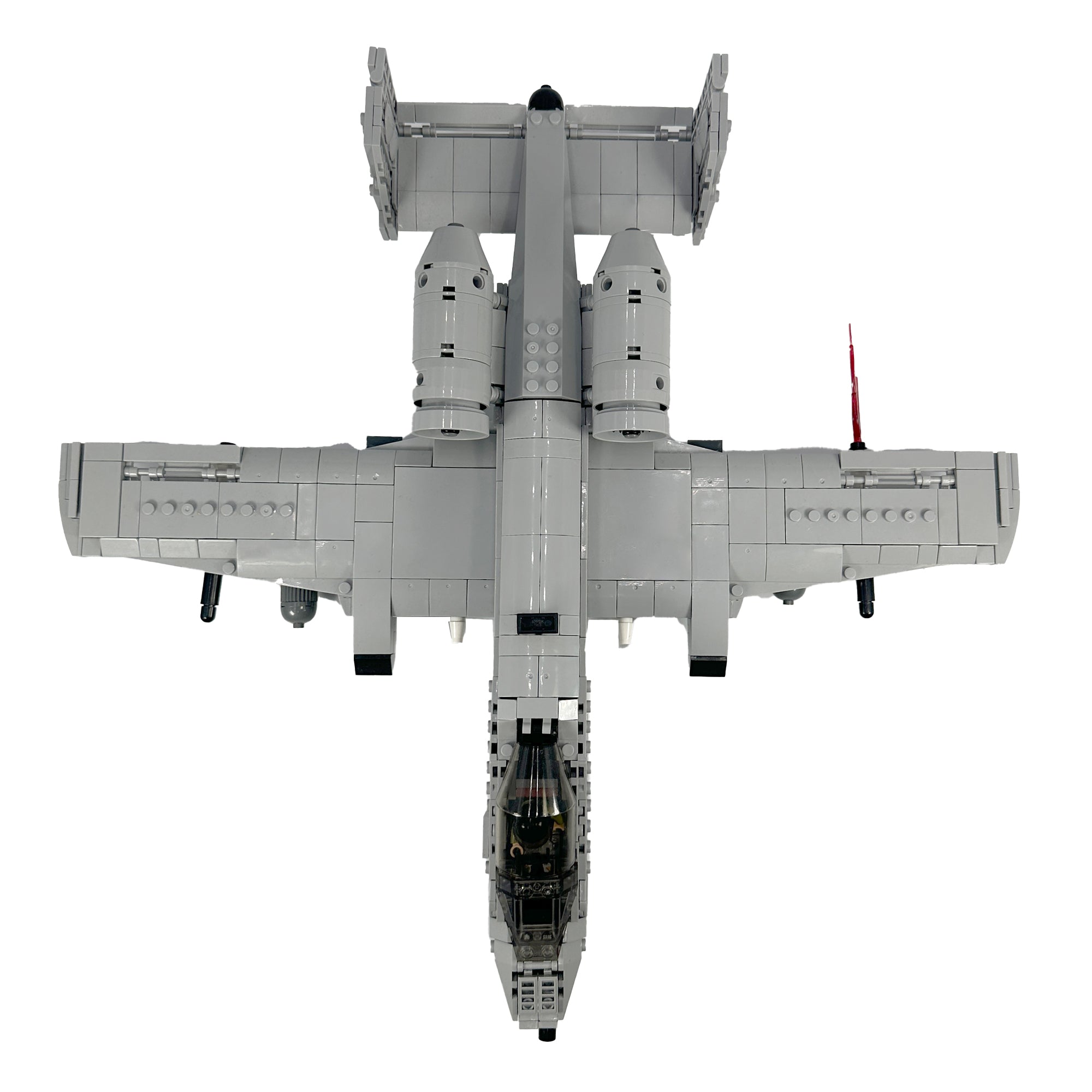 Top-down view of brick-built A-10 aircraft with twin rear engines and GAU-style nose cannon. 