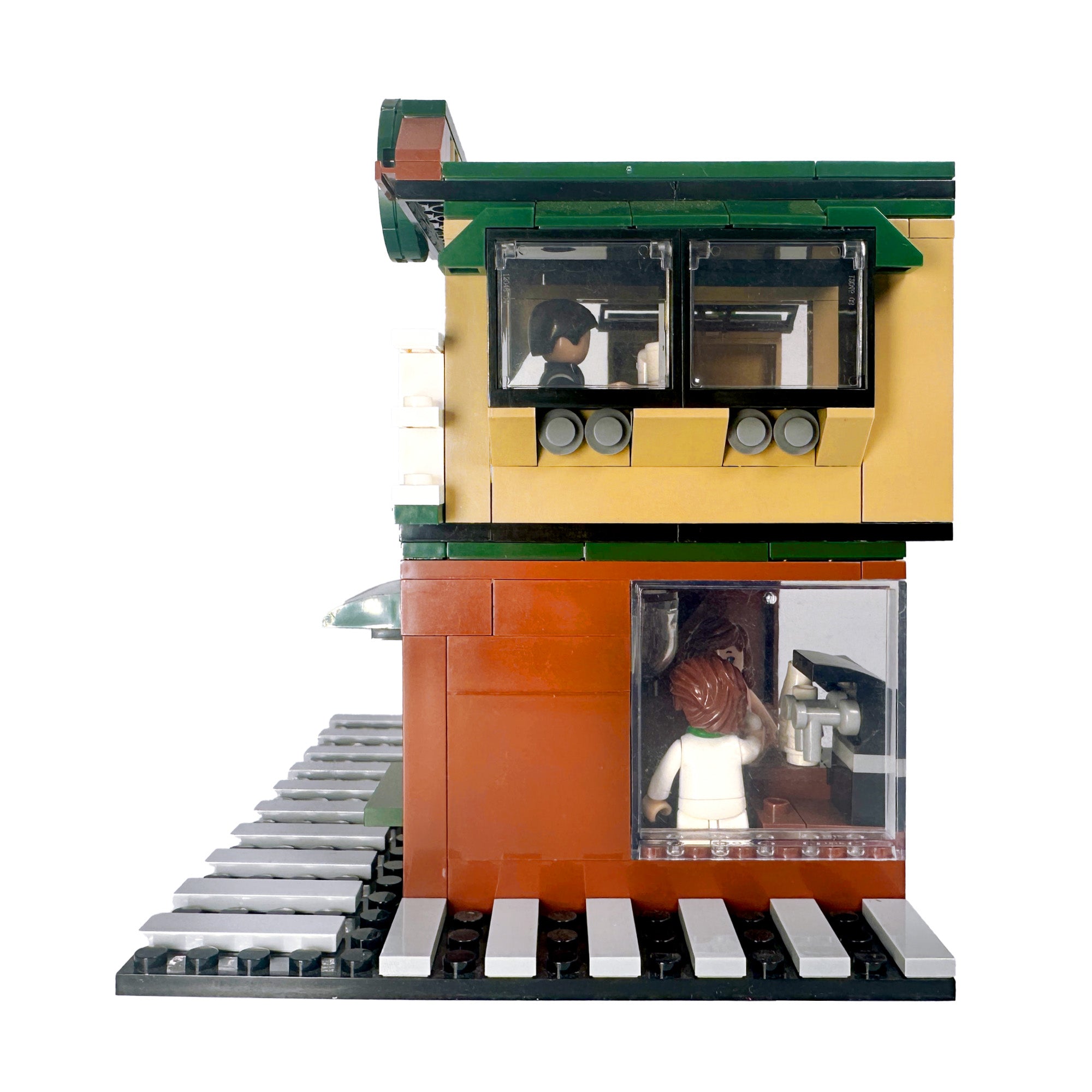 Menu board and cash register details inside Brew Star Café coffee shop model

