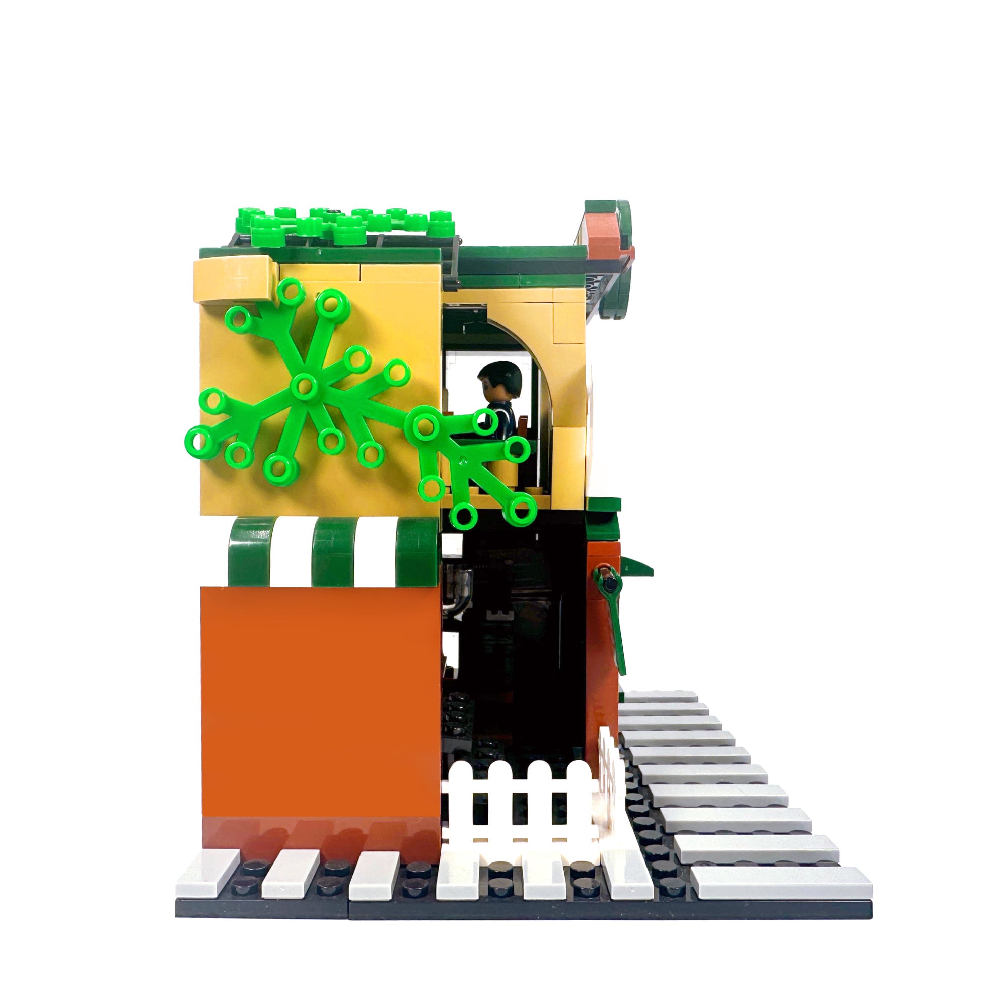 Second floor dining area with tables and chairs at Brew Star Café building set

