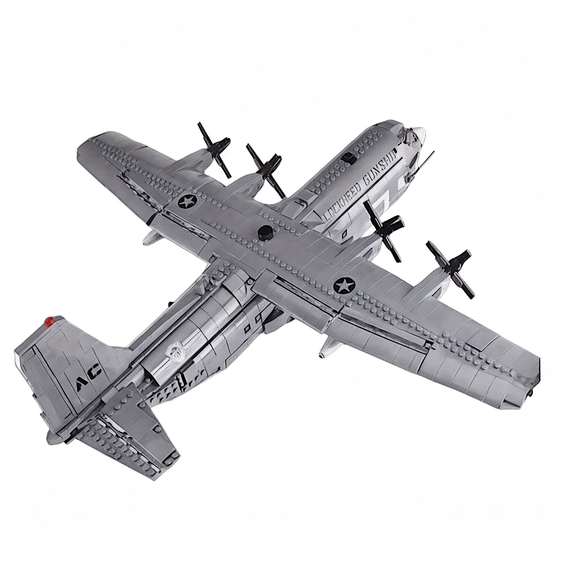 A completed model of an AC-130 Hercules Air Gunship made from building blocks, predominantly gray in color, resembling the aircraft's metallic finish.