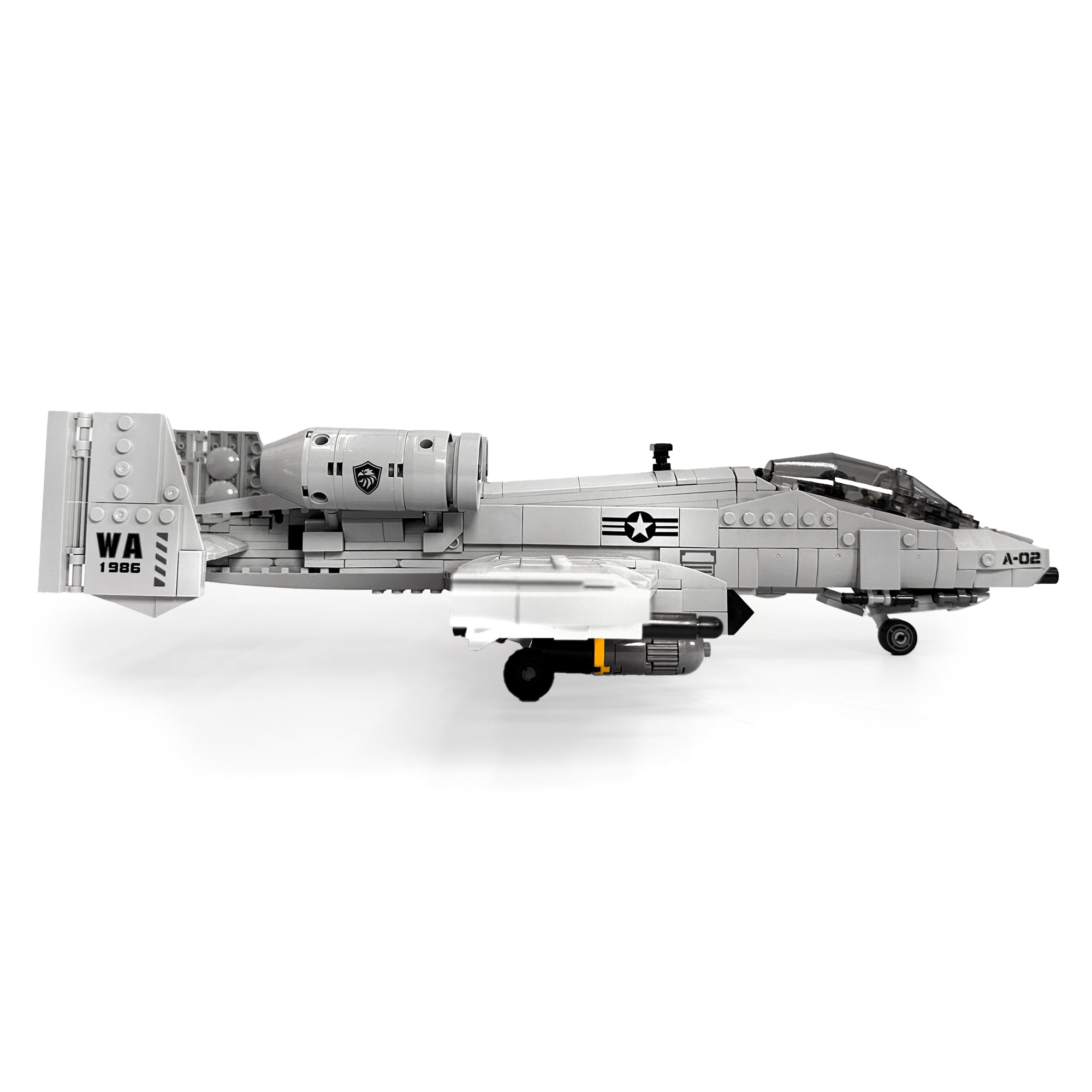 Grey A-10 replica built from blocks, shown from the right with detailed cockpit and wing-mounted armaments. 