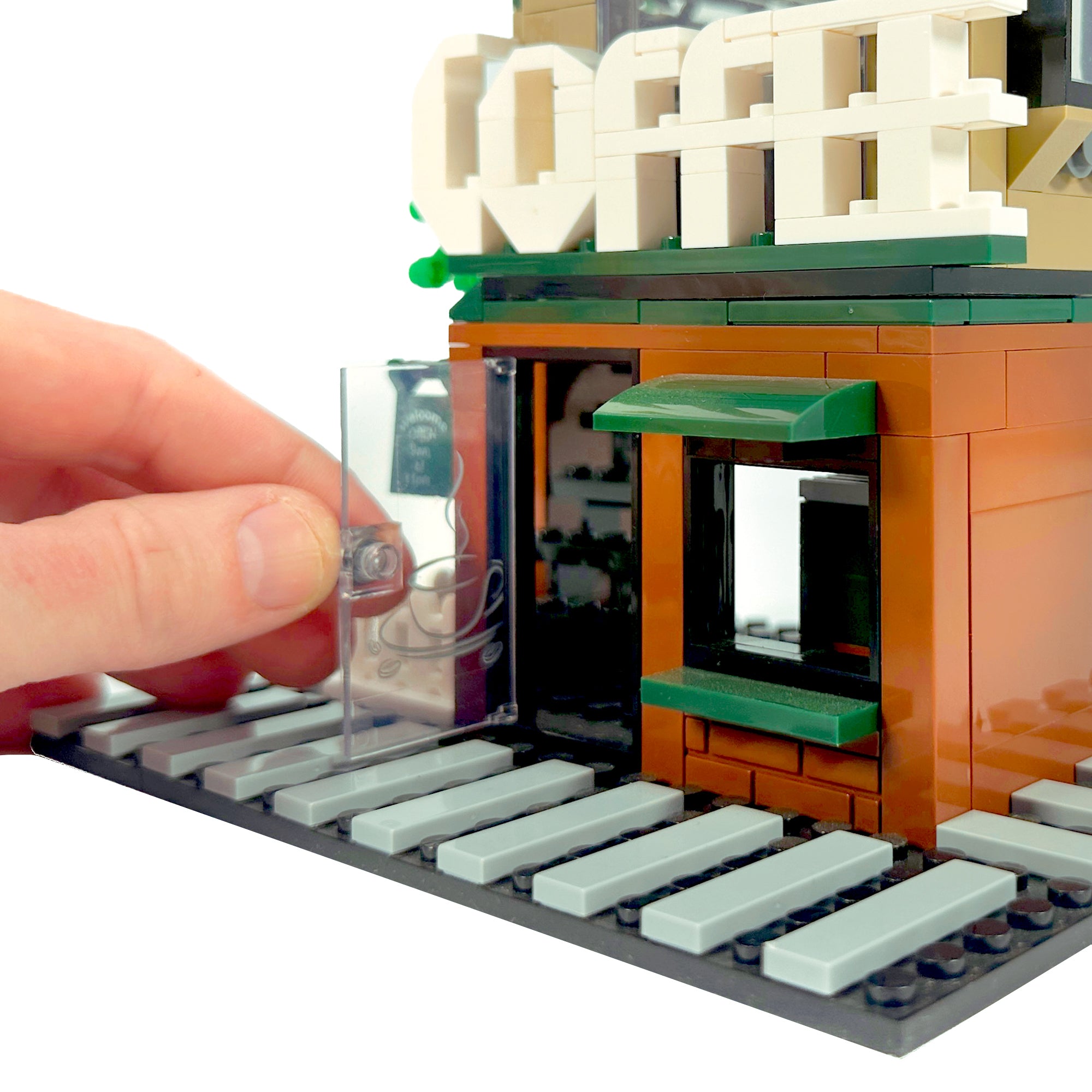 City street view showing Brew Star Café coffee shop building in urban scene

