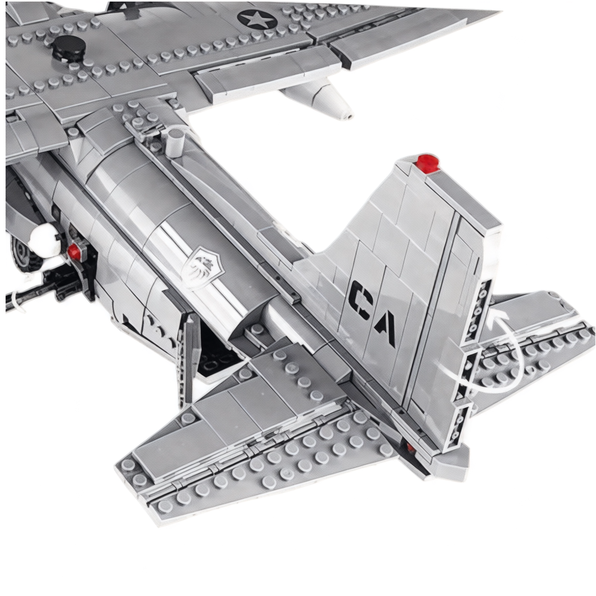 Rear view of gunship building block set, showing tail fin, wings, and open side hatch detail. 