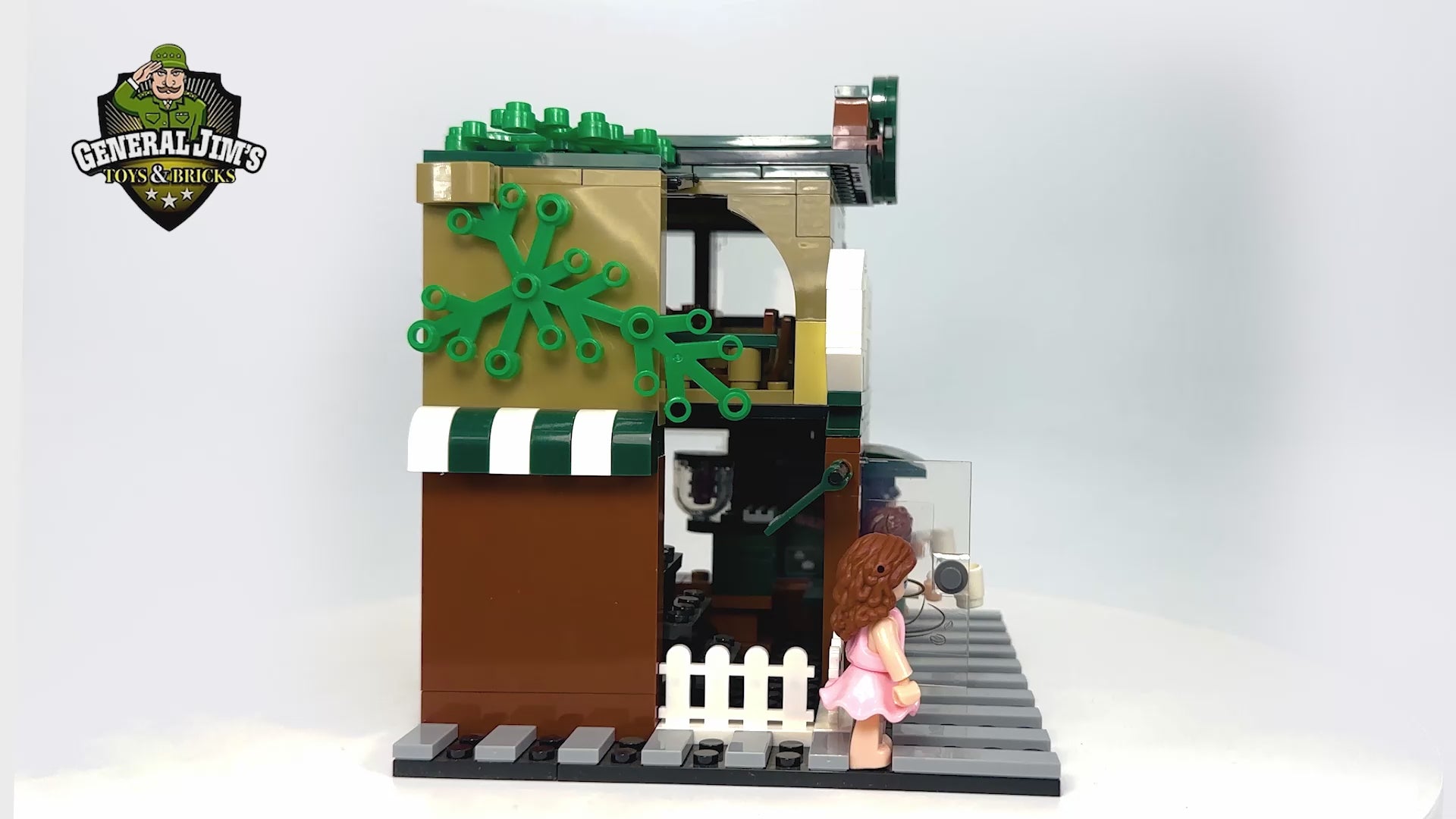 Watch the full build and details of the Brew Star Café Coffee Shop Building Blocks Set. Features 283 pieces, a two-story layout, café counter, and dining area.